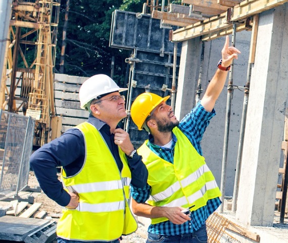 Two men at construction site